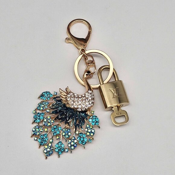 Authentic Louis Vuitton Lock & Key with unbranded Peacock Bagcharm, Keycharm - Picture 7 of 8